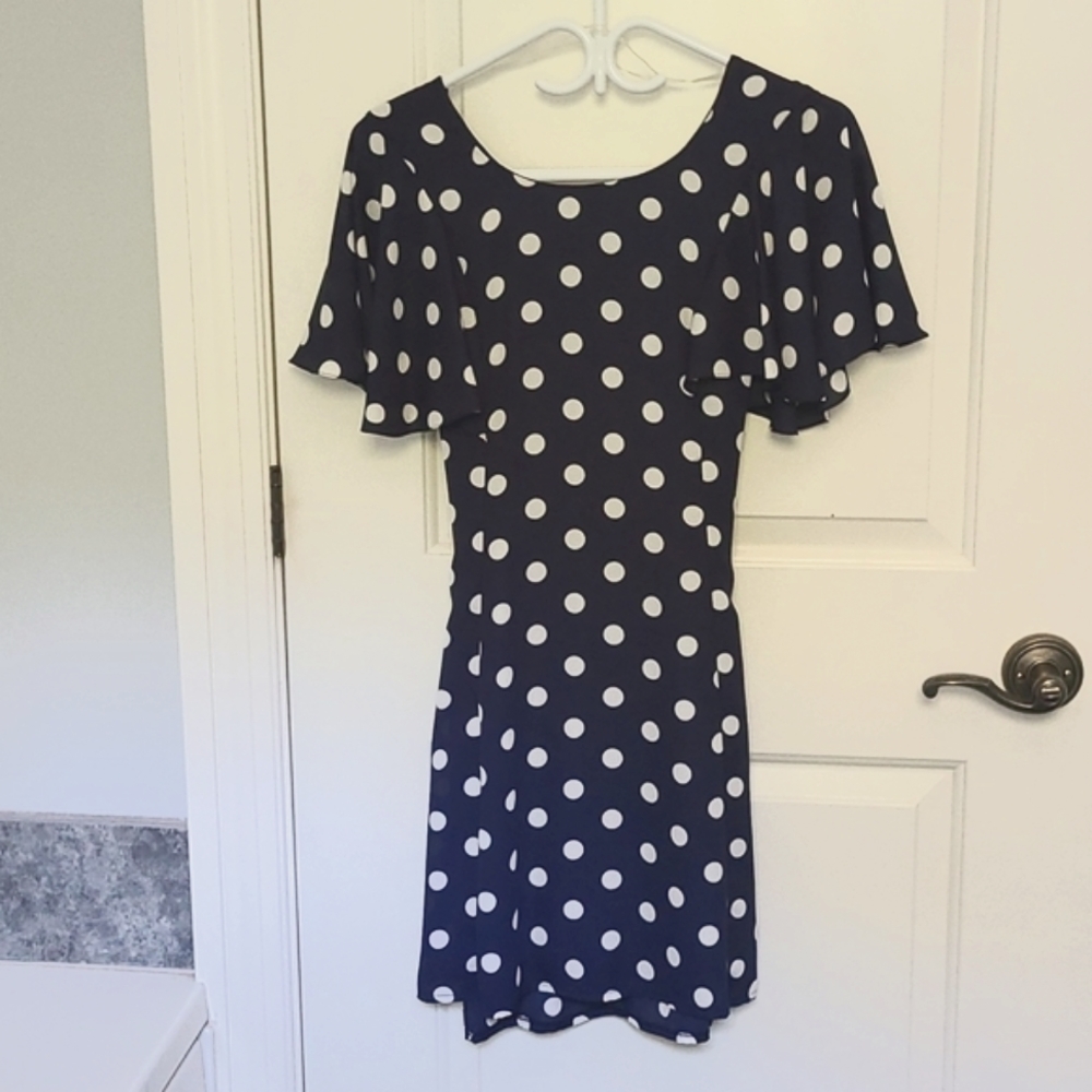 NWT Pretty polkadot dress with flutter sleeves. Size 38 Never worn,new with tags
